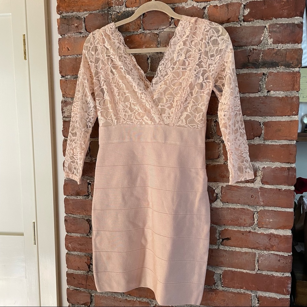 Lace bodycon bebe dress with elbow length lace sleeve